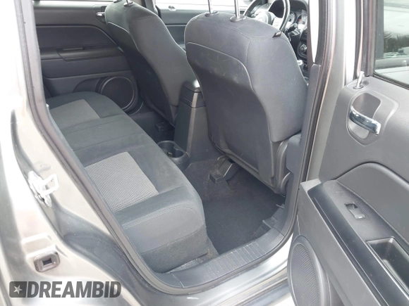 2011 Jeep Compass with VIN 1J4NF1FB1BD251618, listed as a IAAI auction lot 41633368 with 125,326 mi miles. Bid and sale history available at carsss.com. Image 8.
