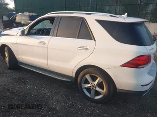 2018 Mercedes-Benz GLE 350 with VIN 4JGDA5HB3JB159999, listed as a IAAI auction lot 42642708 with 135,978 mi miles and . Bid and sale history available at DreamBid. Image 3.