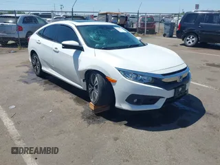 2016 Honda Civic EX-L z VIN 2HGFC1F83GH636374, wystawiony jako IAAI lot #42328432 z przebiegiem 130 738 mil mil oraz . Historia ofert i sprzedaży dostępna na DreamBid. Obrazek 1.