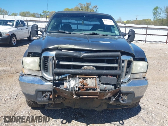 2002 Ford F-250 XL z VIN 1FTNW21L92EC03726, wystawiony jako IAAI lot #41860963 z przebiegiem 201 404 mil mil oraz . Historia ofert i sprzedaży dostępna na DreamBid. Obrazek 6.
