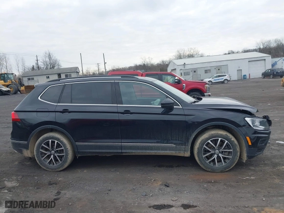 2021 Volkswagen Tiguan SE with VIN 3VV2B7AX0MM049291, listed as a IAAI auction lot 41910106 with 68,468 mi miles. Bid and sale history available at carsss.com. Image 13.