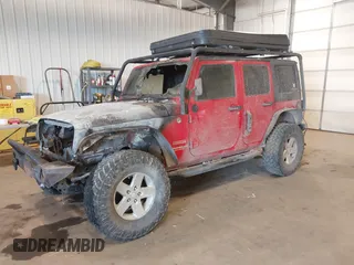 2011 Jeep Wrangler Unlimited Sport with VIN 1J4HA3H1XBL534312, listed as a IAAI auction lot 41030703 with 1 mi miles. Bid and sale history available at carsss.com. Image 2.