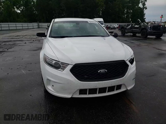 2015 Ford Police Interceptor with VIN 1FAHP2L82FG163718, listed as a Copart auction lot 56392295 with 122,940 mi miles and Salvage title. Bid and sale history available at DreamBid. Image 13.