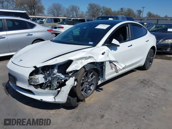 2023 Tesla Model 3 z VIN 5YJ3E1EA0PF608506, wystawiony jako IAAI lot #41748862 z przebiegiem 15 mil mil oraz . Historia ofert i sprzedaży dostępna na DreamBid. Obrazek 2.