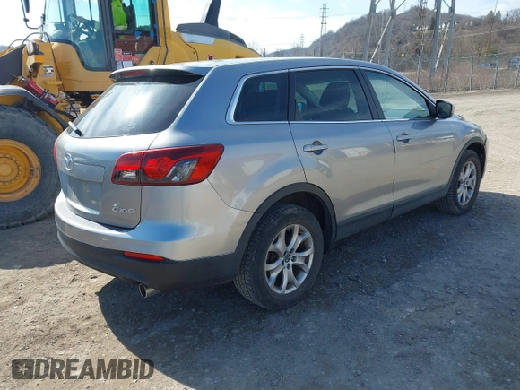 2015 Mazda CX-9 Sport with VIN JM3TB2BA6F0455539, listed as a IAAI auction lot 41839466 with 143,667 mi miles and . Bid and sale history available at carsss.com. Image 4.