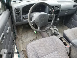 1997 Nissan Frontier XE with VIN 1N6SD16Y0VC329686, listed as a Copart auction lot 73103584 with 105,657 mi miles and Salvage title. Bid and sale history available at DreamBid. Image 8.