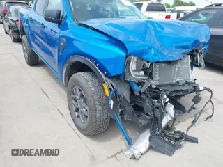 2024 Ford Ranger XLT with VIN 1FTER4GH0RLE60866, listed as a IAAI auction lot 42116104 with 10,074 mi miles and . Bid and sale history available at DreamBid. Image 20.