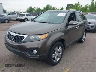 2012 Kia Sorento EX with VIN 5XYKUCA6XCG294104, listed as a IAAI auction lot 42413363 with 57,527 mi miles and . Bid and sale history available at DreamBid. Image 2.