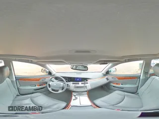 2005 Toyota Avalon XL z VIN 4T1BK36B65U041287, wystawiony jako Copart lot #56566535 z przebiegiem 223 562 mil mil oraz Szkoda całkowita • Salvage title. Historia ofert i sprzedaży dostępna na DreamBid. Obrazek 14.