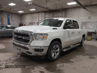 2019 Ram 1500 Big Horn/Lone Star with VIN 1C6SRFFT7KN645776, listed as a IAAI auction lot 41395240 with 136,068 mi miles. Bid and sale history available at carsss.com. Image 2.