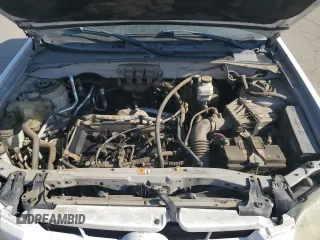 2005 Mazda Tribute i with VIN 4F2YZ02Z95KM24700, listed as a Copart auction lot 42002775 with 128,891 mi miles and Salvage Title. Bid and sale history available at carsss.com. Image 11.