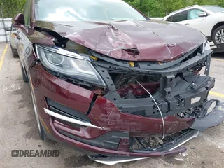 2018 Lincoln MKC Premiere z VIN 5LMCJ1C98JUL30207, wystawiony jako IAAI lot #42275853 z przebiegiem 51 206 mil mil oraz . Historia ofert i sprzedaży dostępna na DreamBid. Obrazek 19.
