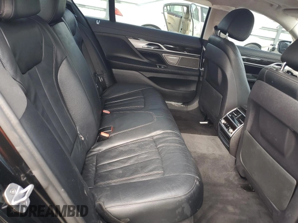 2018 BMW 7 Series 740i with VIN WBA7E2C59JB216290, listed as a Copart auction lot 89082215 with 56,020 mi miles and Salvage Title. Bid and sale history available at carsss.com. Image 10.