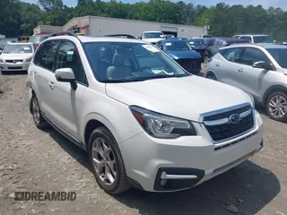 2017 Subaru Forester Touring z VIN JF2SJAWC1HH463163, wystawiony jako IAAI lot #42480107 z przebiegiem 70 337 mil mil oraz . Historia ofert i sprzedaży dostępna na DreamBid. Obrazek 13.