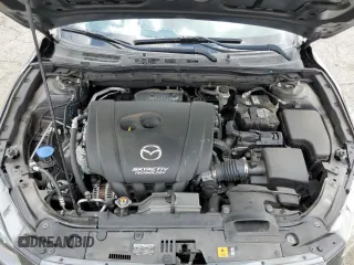 2018 Mazda 3 Touring z VIN 3MZBN1L38JM219466, wystawiony jako Copart lot #56766025 z przebiegiem 124 775 mil mil oraz Szkoda całkowita • Salvage title. Historia ofert i sprzedaży dostępna na DreamBid. Obrazek 11.