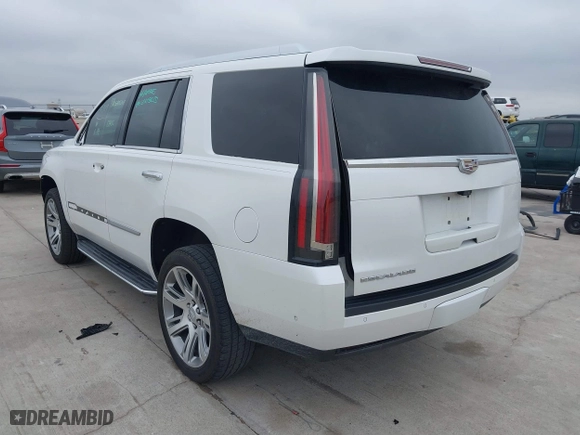 2018 Cadillac Escalade Luxury with VIN 1GYS3BKJ2JR223679, listed as a IAAI auction lot 41429770 with 76,440 mi miles. Bid and sale history available at carsss.com. Image 3.