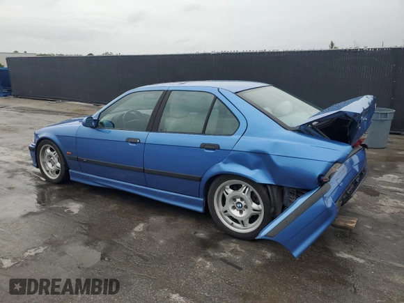 1998 BMW M3 with VIN WBSCD932XWEE08788, listed as a Copart auction lot 59890125 with 207,434 mi miles and Salvage title. Bid and sale history available at DreamBid. Image 2.
