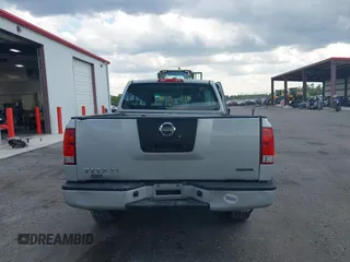 2012 Nissan Titan SE with VIN 1N6BA0CH0CN326229, listed as a IAAI auction lot 41975273 with 106,946 mi miles. Bid and sale history available at carsss.com. Image 16.