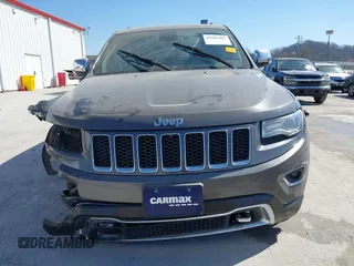 2015 Jeep Grand Cherokee Overland with VIN 1C4RJECT2FC648292, listed as a IAAI auction lot 41806402 with 116,766 mi miles. Bid and sale history available at carsss.com. Image 13.