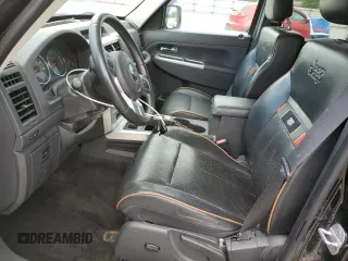 2011 Jeep Liberty Sport with VIN 1J4PN2GK5BW561274, listed as a Copart auction lot 60652555 with 89,309 mi miles and Salvage title. Bid and sale history available at DreamBid. Image 7.