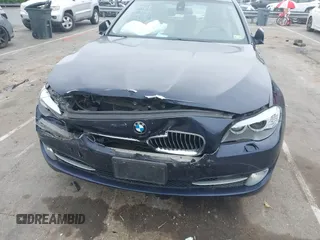 2012 BMW 5 Series 528i xDrive with VIN WBAXH5C58CDW08404, listed as a IAAI auction lot 42222460 with 146,851 mi miles and . Bid and sale history available at DreamBid. Image 6.