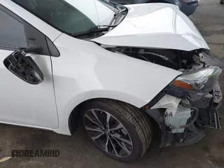 2019 Toyota Corolla L with VIN 5YFBURHE7KP862111, listed as a IAAI auction lot 42205368 with 96,823 mi miles and . Bid and sale history available at DreamBid. Image 19.