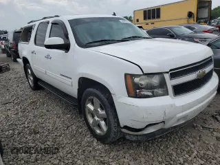 2011 Chevrolet Suburban LT with VIN 1GNSKJE3XBR392454, listed as a Copart auction lot 54828104 with 207,113 mi miles and Salvage Title. Bid and sale history available at carsss.com. Image 4.