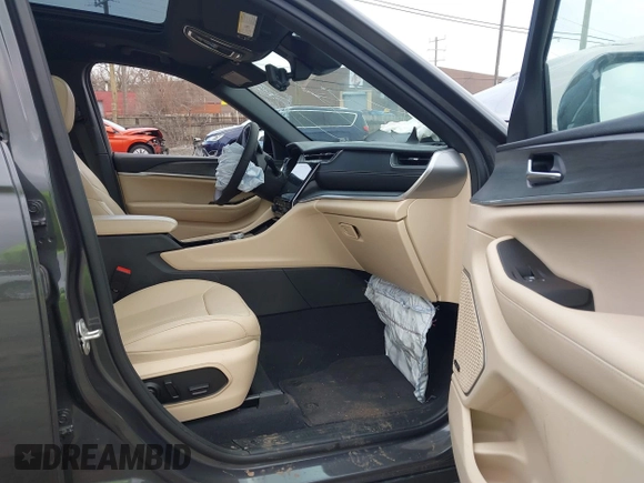 2023 Jeep Grand Cherokee Limited with VIN 1C4RJHBG1PC642541, listed as a IAAI auction lot 41959275 with 10,535 mi miles and . Bid and sale history available at DreamBid. Image 5.