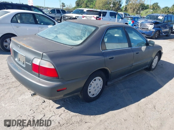 1997 Honda Accord Value with VIN 1HGCD5689VA182425, listed as a IAAI auction lot 41702660 with 208,005 mi miles and . Bid and sale history available at carsss.com. Image 4.