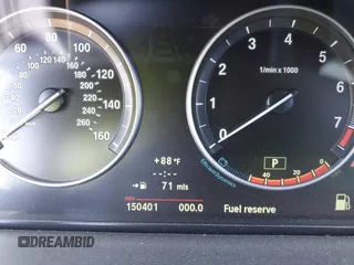 2013 BMW 5 Series 528i with VIN WBAXG5C58DD232582, listed as a IAAI auction lot 41890082 with 150,401 mi miles and . Bid and sale history available at carsss.com. Image 7.