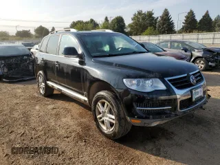 2010 Volkswagen Touareg VR6 with VIN WVGBF7A9XAD001790, listed as a Copart auction lot 70806534 with 90,103 mi miles and Salvage Title. Bid and sale history available at DreamBid. Image 4.