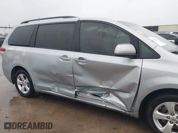 2014 Toyota Sienna LE AAS with VIN 5TDKK3DC9ES501255, listed as a IAAI auction lot 42096386 with 347,364 mi miles and . Bid and sale history available at carsss.com. Image 6.