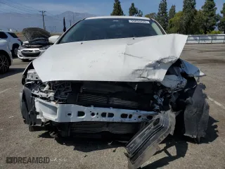 2017 Ford Focus SE with VIN 1FADP3K26HL223348, listed as a Copart auction lot 54056455 with 65,700 mi miles and Salvage Title. Bid and sale history available at carsss.com. Image 5.