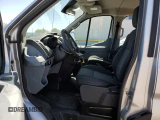 2015 Ford Transit XL with VIN 1FMZK1YMXFKB16362, listed as a Copart auction lot 57024515 with 112,665 mi miles and Salvage title. Bid and sale history available at DreamBid. Image 7.