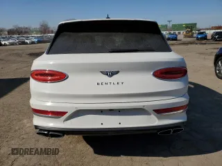 2022 Bentley Bentayga V8 с VIN SJAAM2ZV2NC017389, выставлен на аукционе Copart как лот 48965325 с пробегом 18 746 миль миль и Списание • Salvage title. История ставок и продаж доступна на DreamBid. Изображение 6.