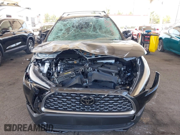 2023 Toyota Corolla Cross XLE with VIN 7MUDAAAG8PV072030, listed as a IAAI auction lot 42397573 with 6,584 mi miles and . Bid and sale history available at DreamBid. Image 6.