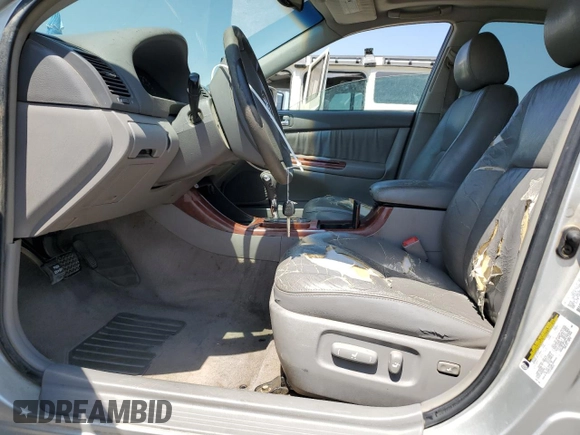 2004 Toyota Camry LE with VIN 4T1BE32K94U300544, listed as a Copart auction lot 60529005 with 223,940 mi miles and Clean title. Bid and sale history available at DreamBid. Image 7.