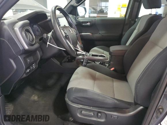 2021 Toyota Tacoma SR with VIN 3TMCZ5ANXMM425903, listed as a Copart auction lot 57963425 with 61,458 mi miles and Salvage title. Bid and sale history available at DreamBid. Image 7.