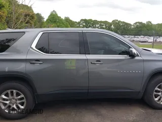 2020 Chevrolet Traverse LS with VIN 1GNERFKW5LJ245009, listed as a IAAI auction lot 42029854 with 77,771 mi miles and . Bid and sale history available at DreamBid. Image 13.
