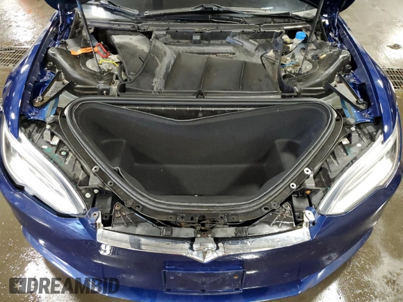 2016 Tesla Model S 90D z VIN 5YJSA1E40GF172712, wystawiony jako Copart lot #63698725 z przebiegiem 99 405 mil mil oraz Szkoda całkowita • Salvage title. Historia ofert i sprzedaży dostępna na DreamBid. Obrazek 12.