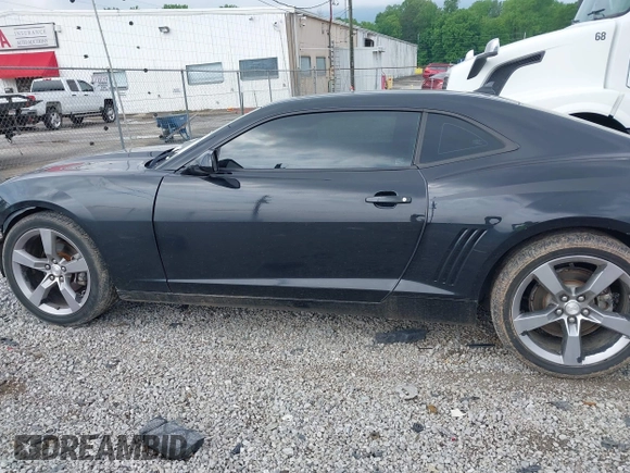 2012 Chevrolet Camaro 1LT z VIN 2G1FB1E3XC9165389, wystawiony jako IAAI lot #42126434 z przebiegiem 140 681 mil mil oraz . Historia ofert i sprzedaży dostępna na DreamBid. Obrazek 14.