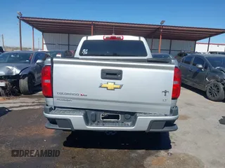2018 Chevrolet Colorado 2WD LT с VIN 1GCGSCEN7J1143893, выставлен на аукционе IAAI как лот 42079057 с пробегом 72 351 миль миль и . История ставок и продаж доступна на DreamBid. Изображение 17.