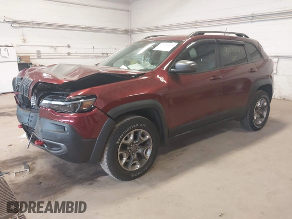 2019 Jeep Cherokee Trailhawk z VIN 1C4PJMBX0KD361981, wystawiony jako IAAI lot #42074093 z przebiegiem 56 989 mil mil oraz . Historia ofert i sprzedaży dostępna na DreamBid. Obrazek 2.