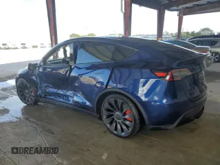 2023 Tesla Model Y Performance with VIN 7SAYGDEF1PF865688, listed as a Copart auction lot 44924385 with 19,255 mi miles and Non Repairable. Bid and sale history available at DreamBid. Image 2.