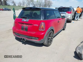 2010 MINI Hardtop S with VIN WMWMF7C51ATX43277, listed as a IAAI auction lot 42107871 with 102,886 mi miles and . Bid and sale history available at DreamBid. Image 4.