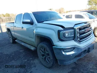 2017 GMC Sierra 1500 SLT z VIN 3GTU2NEC2HG419888, wystawiony jako IAAI lot #41372150 z przebiegiem 135 813 mil mil oraz . Historia ofert i sprzedaży dostępna na DreamBid. Obrazek 1.