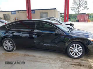2013 Toyota Avalon XLE with VIN 4T1BK1EB6DU056103, listed as a IAAI auction lot 42553318 with 114,143 mi miles and . Bid and sale history available at DreamBid. Image 6.