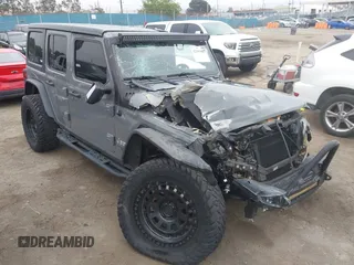 2020 Jeep Wrangler Unlimited Sport S with VIN 1C4HJXDN5LW127004, listed as a IAAI auction lot 42185487 with Not provided miles and . Bid and sale history available at DreamBid. Image 1.