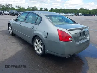 2004 Nissan Maxima SE with VIN 1N4BA41EX4C881792, listed as a IAAI auction lot 42083849 with 166,034 mi miles. Bid and sale history available at carsss.com. Image 3.