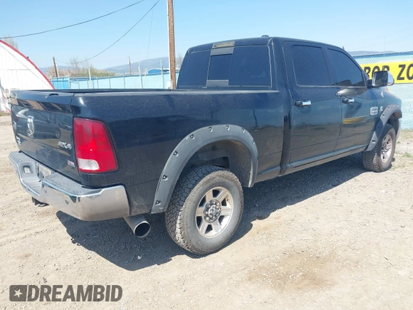 2012 Ram 2500 Laramie Longhorn with VIN 3C6UD5GL8CG182590, listed as a IAAI auction lot 42135638 with 232,377 mi miles and . Bid and sale history available at DreamBid. Image 4.